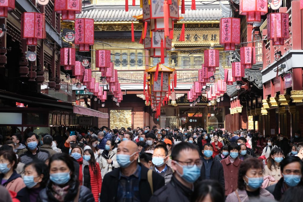 Crowded tourists in face mask in Shanghai