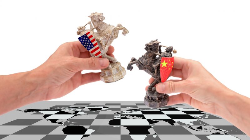 How do Chinese companies overcome challenges for global expansion